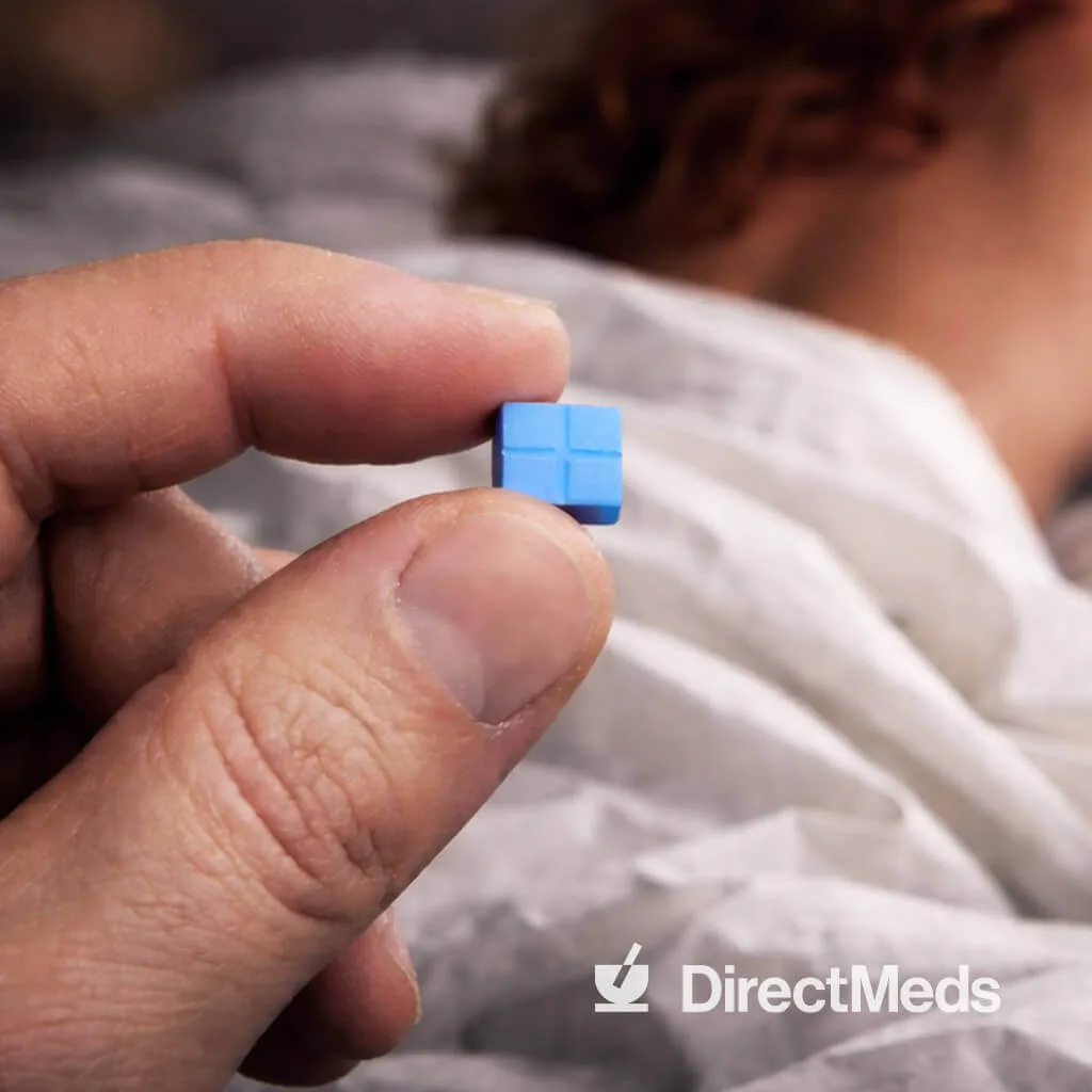 Holding a DirectMax rapid-dissolve tablet